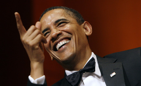 President Barack Obama laughs during the beginning of the Radio and Television Correspondents Dinner, Friday, June 19, 2009, in Washington. (AP Photo/Haraz N. Ghanbari)