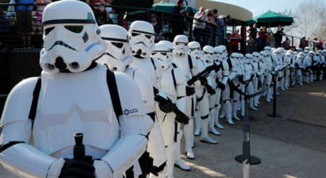 Star Wars Stormtroopers pose for photographers in a queue at Legoland in Windsor west of London on March 24, 2012, to mark the launch of the new Star Wars Miniland Experience. AFP PHOTO/CARL COURT